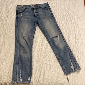 Distressed light wash ankle length  denim